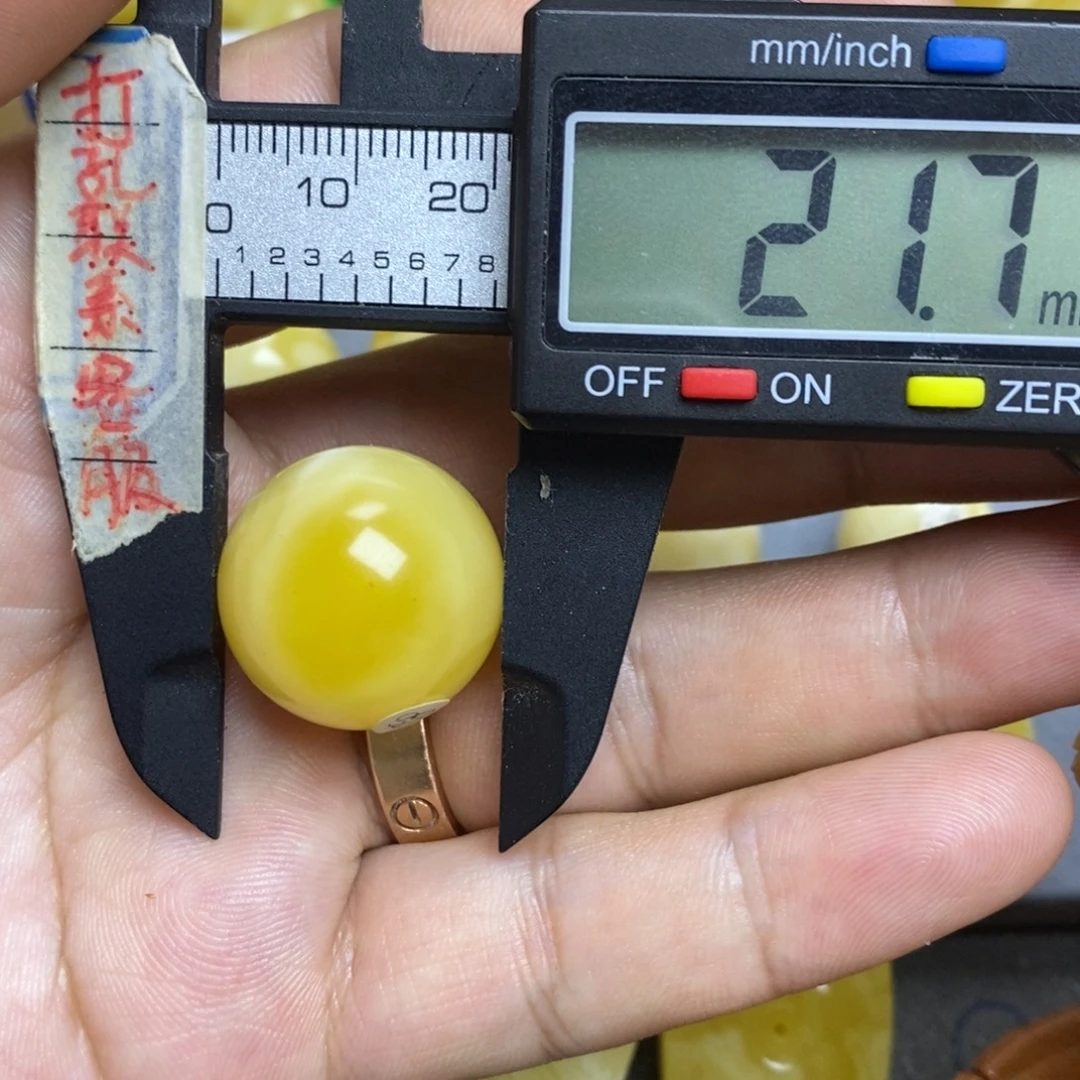 蜜蜡未镶嵌裸石21.7微瑕圆珠默认直发