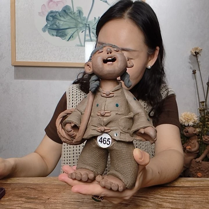 紫砂不规则羲媧娃系列作品挎筐女娃