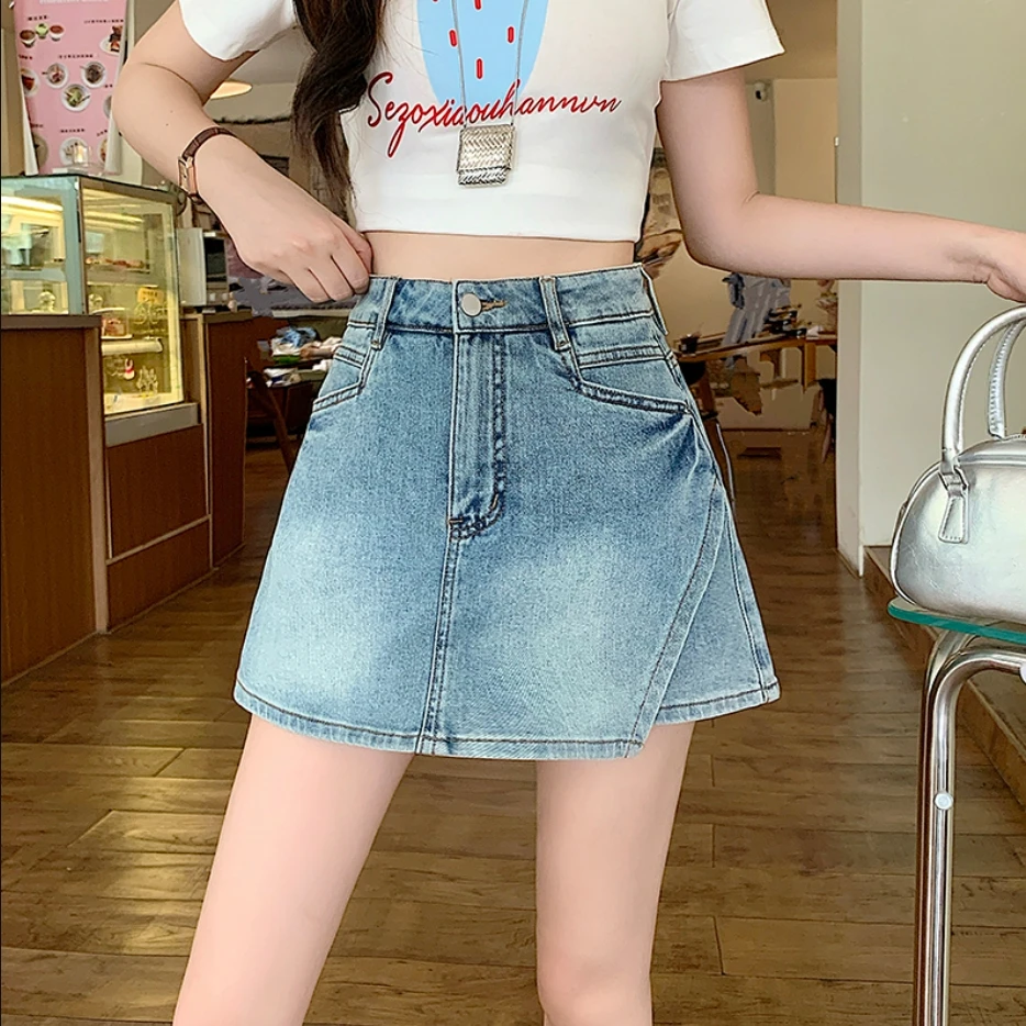 JJ30644大码2025夏装新款A字版型显瘦辣妹不对称牛仔半身裙短裙