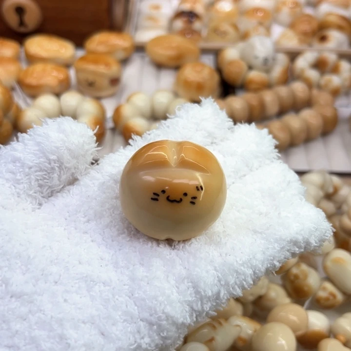 手串菩提根/象牙果77 象牙果布丁猫手把件