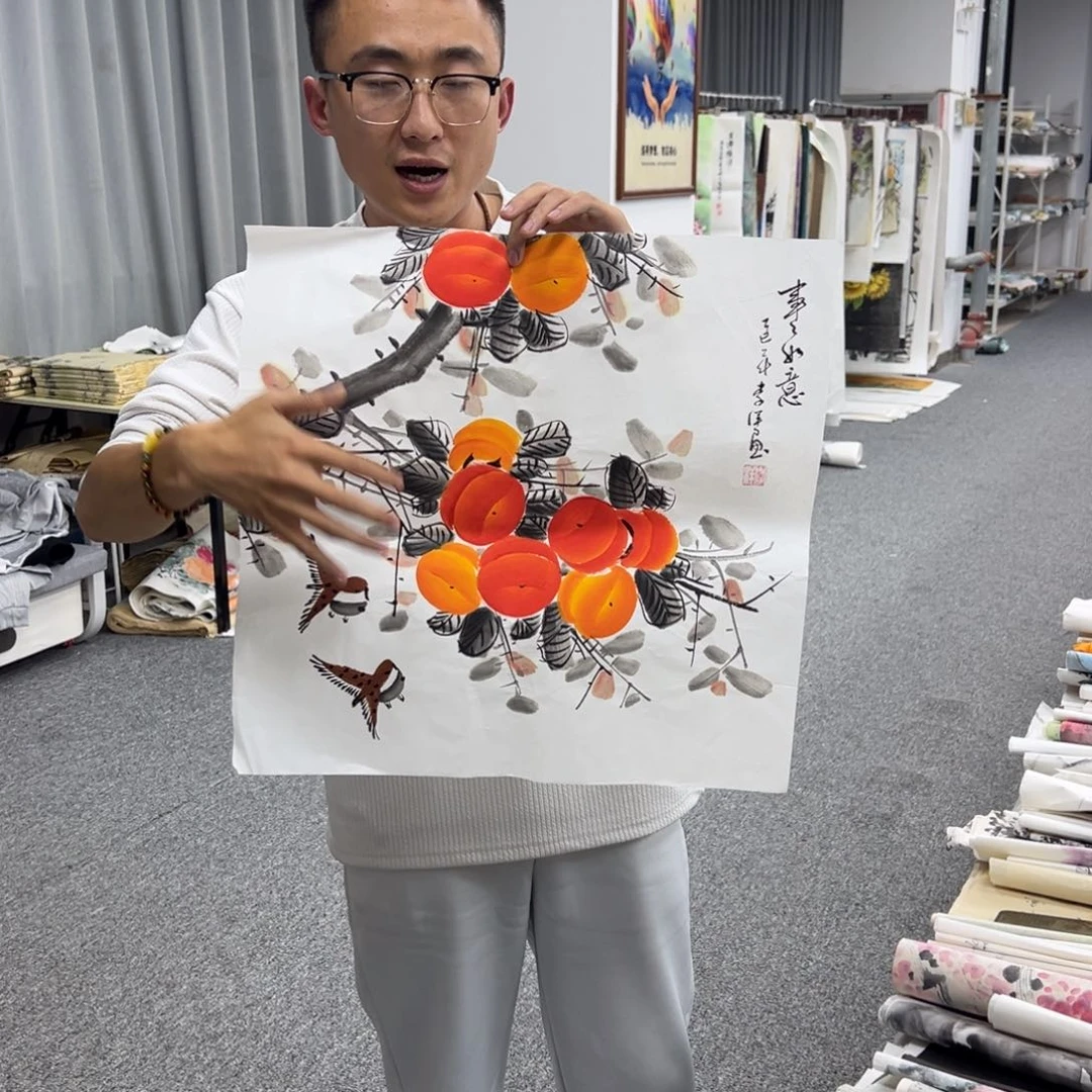 国画卖字画的小男孩