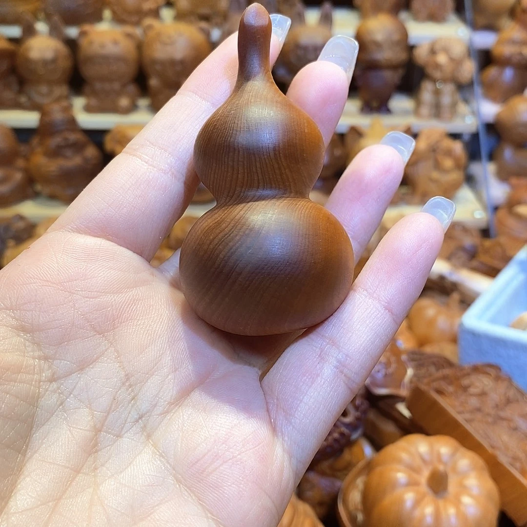 洒***光木崖柏木雕手把件葫芦