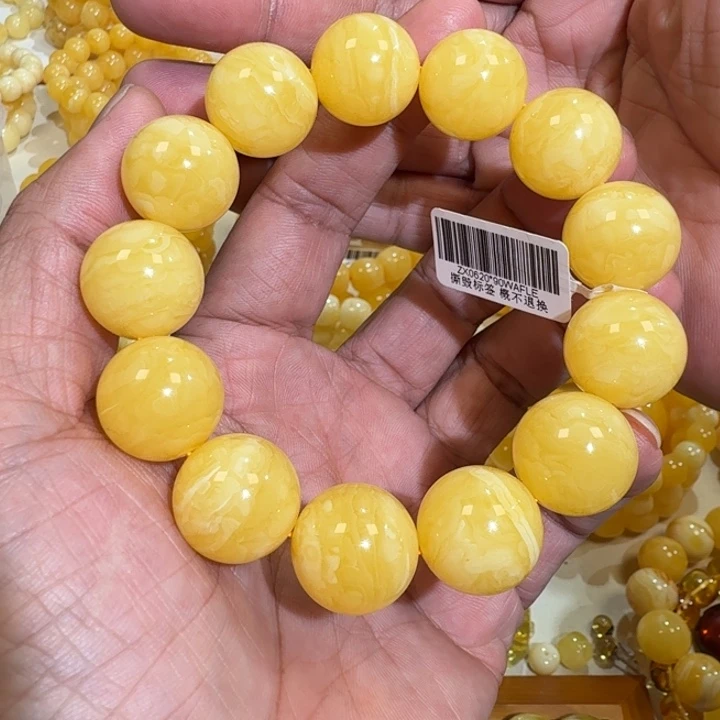 琥珀未镶嵌珠宝奇石18m焦皮同料橘黄花蜡串43.3克