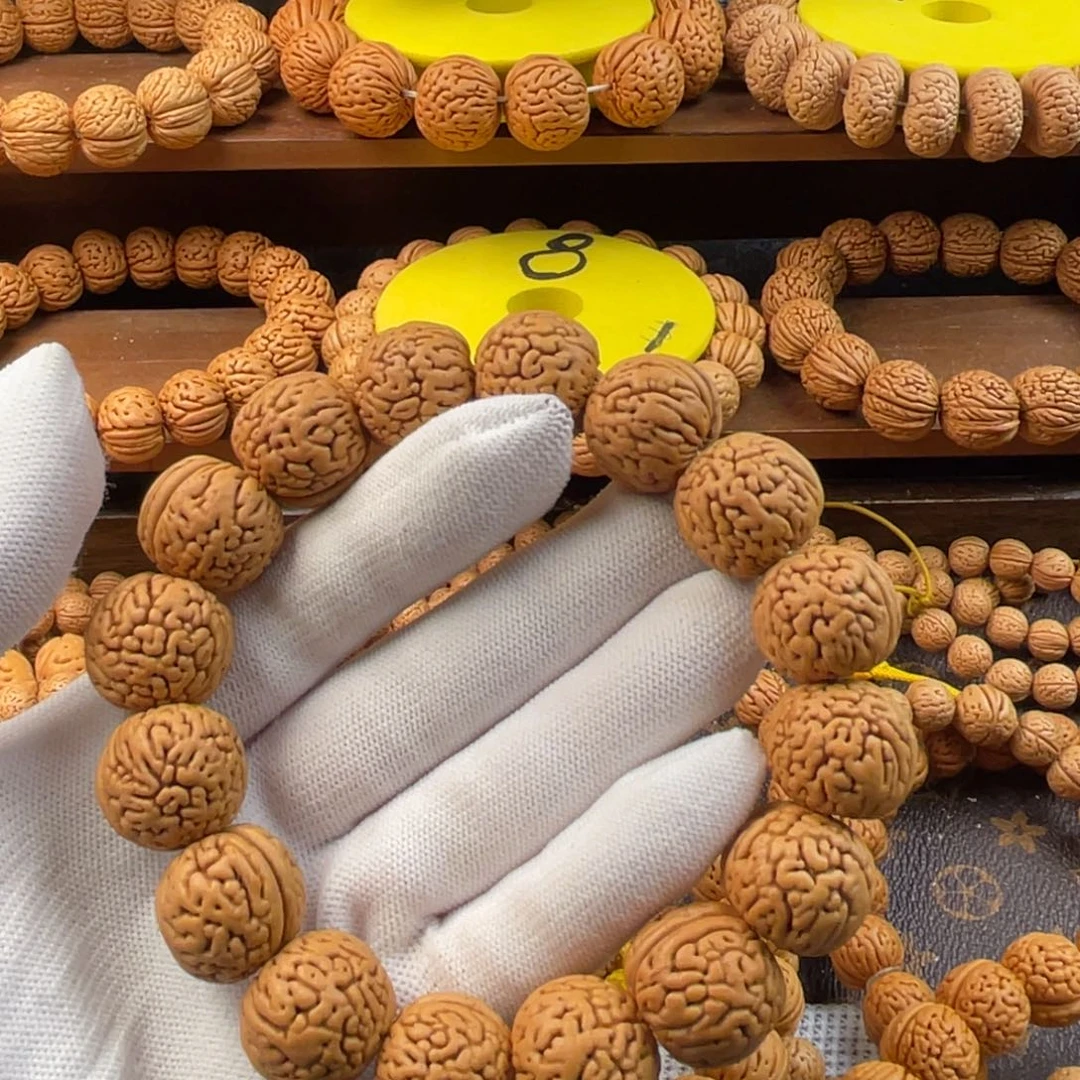 浮***梦桃核吊坠盘锦肌肉