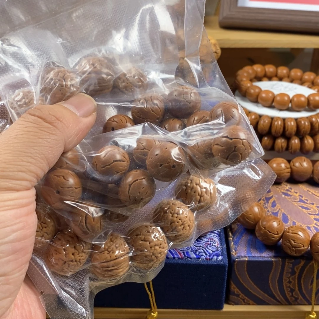 桃核手串忘*了龙纹桃核苹果圆光珠