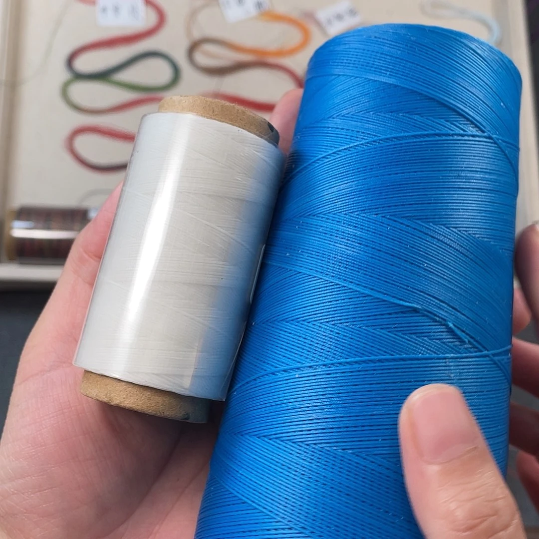 聚酯纤维0.3扁蜡50克白➕天蓝色
