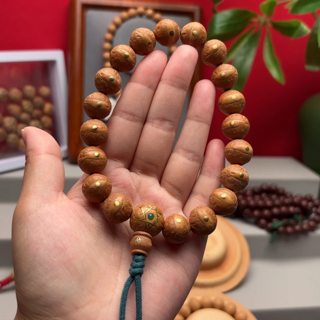 吊坠凤眼菩提14左右铜钉手串