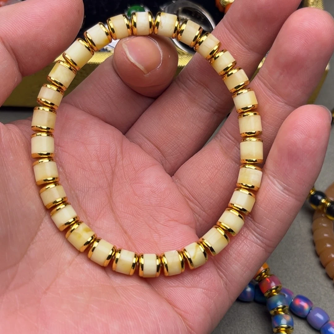 镀金金盾白蜡手串一条随机发