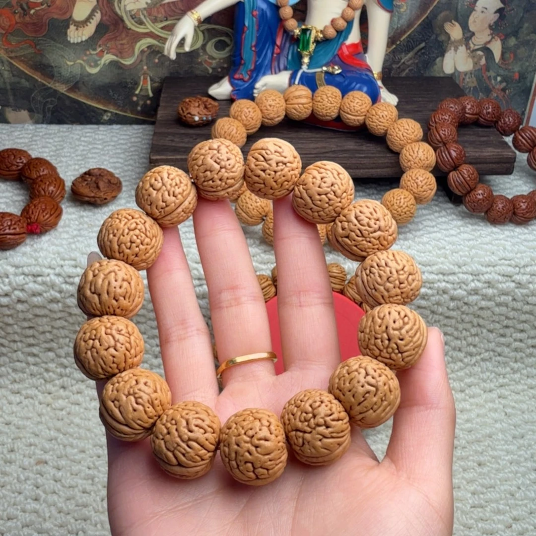 涛***哥桃核吊坠肌肉纹手串