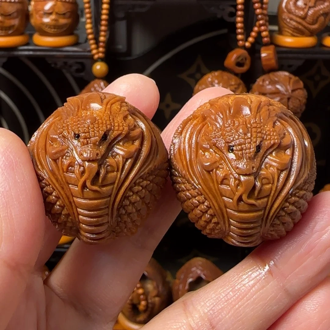 橄榄核把件蛇手把件