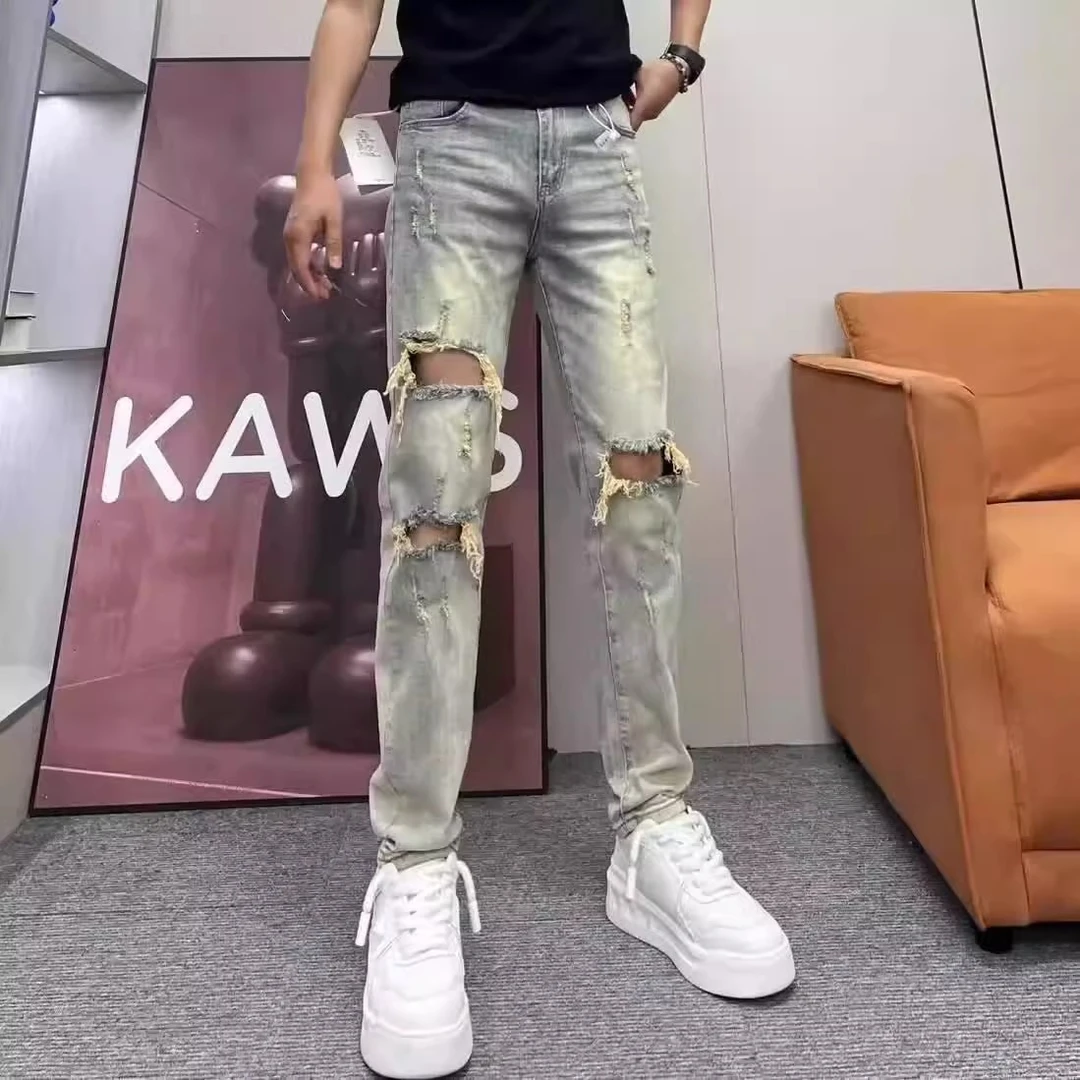 设计款破洞浅色牛仔裤男春夏季新款时尚刮烂弹力修身小脚乞丐裤子