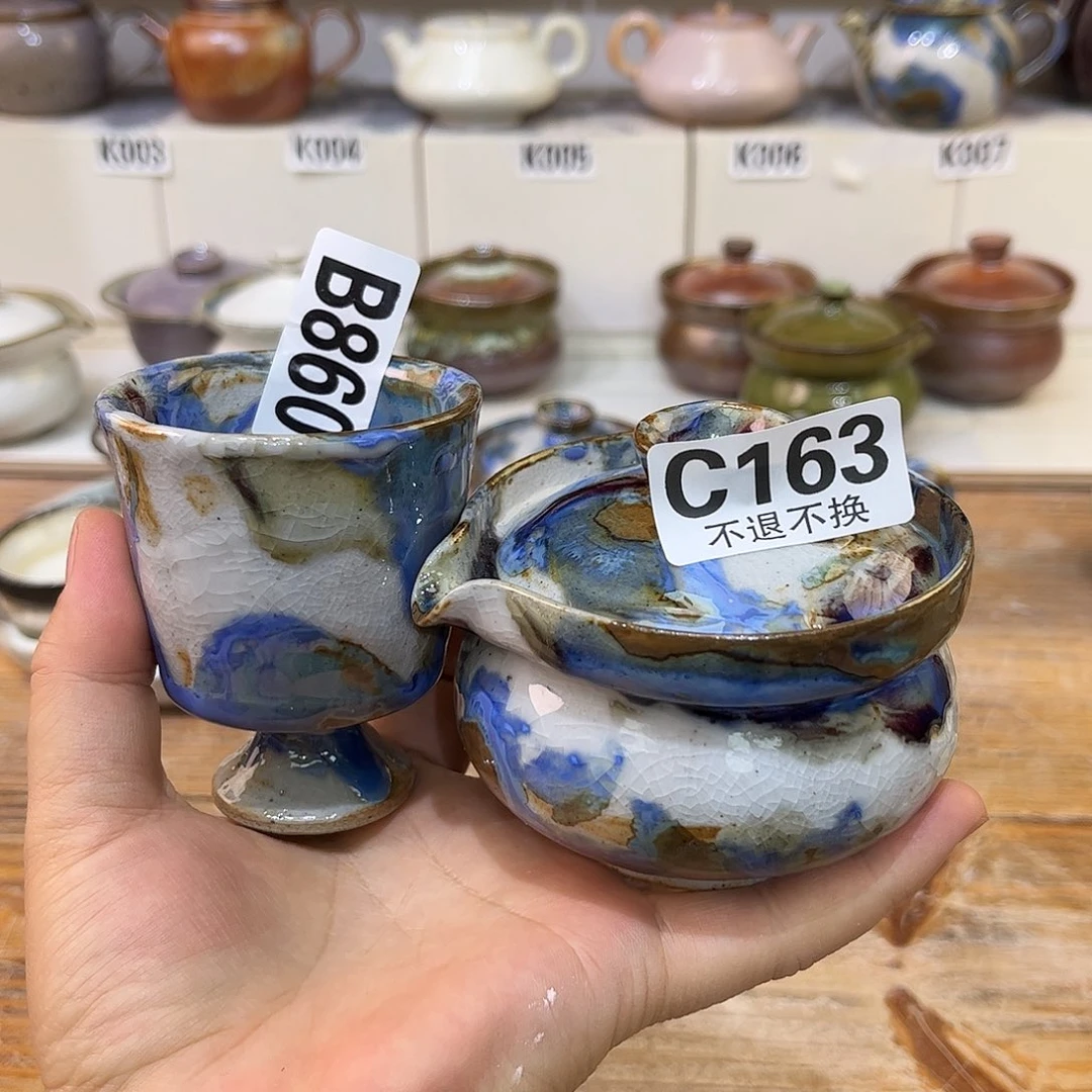 白泥茶杯庄**?陶瓷艺术