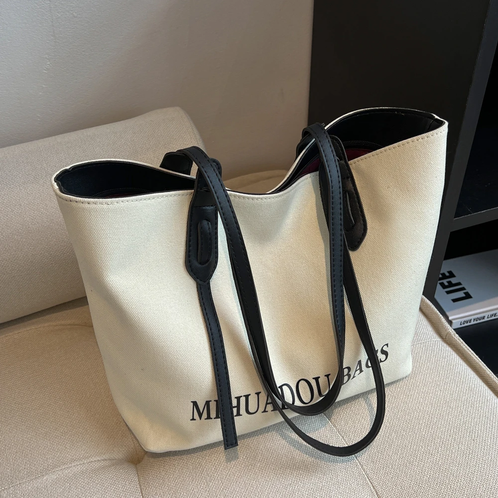 帆布包包女大容量2025新款日系布包单肩包大学生上课通勤包托特包