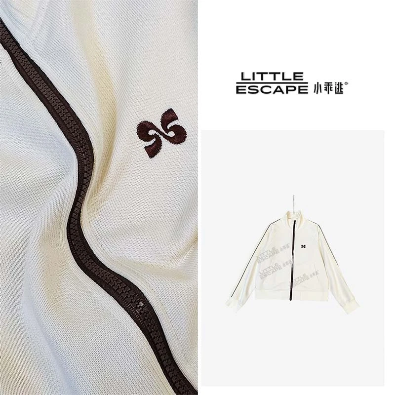 小乖逃优雅简约白色外套拼黑线插肩红色刺绣风车飘带潮流S25531