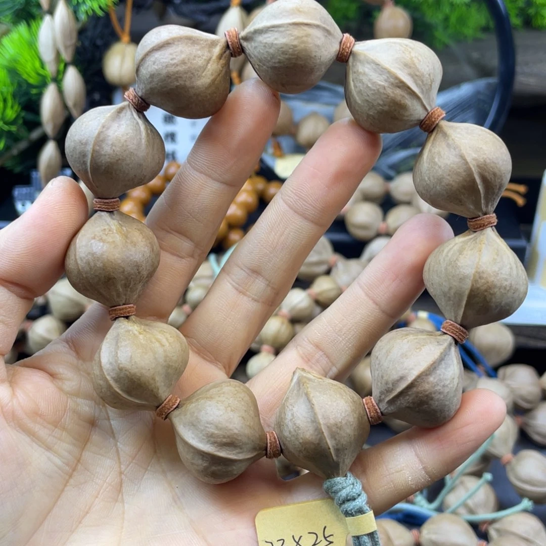 柴***板橄榄核吊坠2325红核