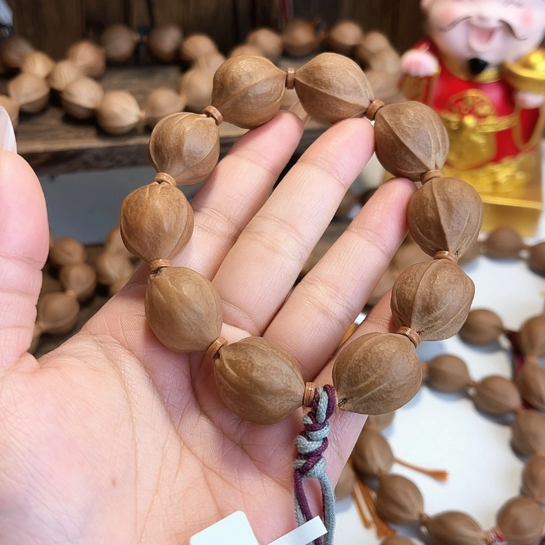 哈***齐手串/手链橄榄核梅林