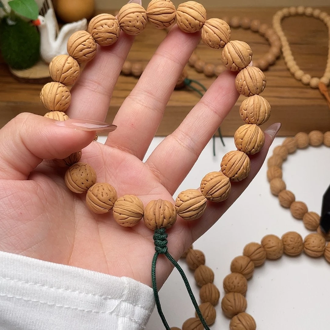 都***呀12加野生小肠纹桃核手持