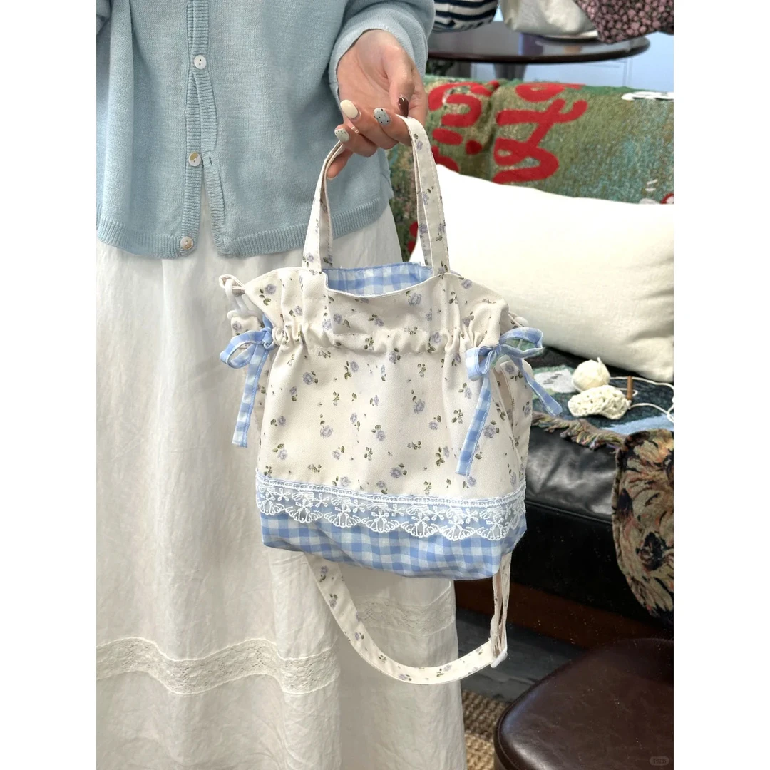 韩系帆布碎花格子拼接手提包包女2025新款抽绳束口手拎斜挎单肩包