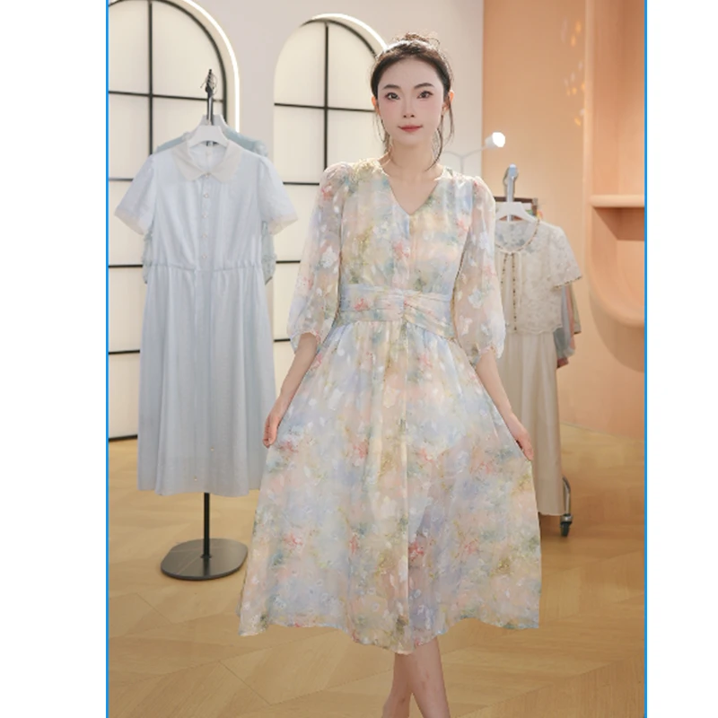 L553减龄高端V领印花连衣裙2025夏季新款法式短袖时尚显瘦A字裙