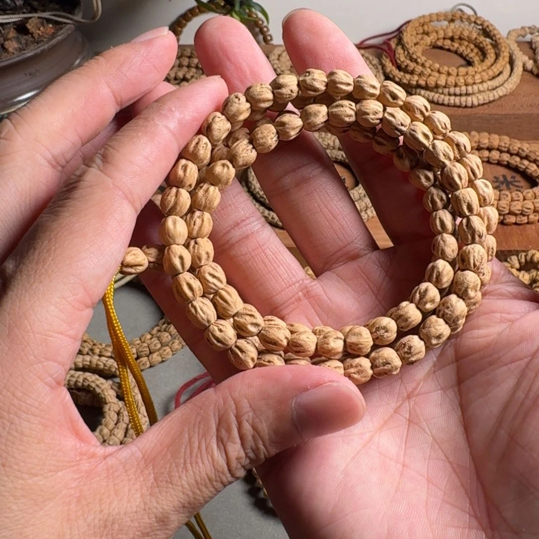 柏香籽/百香籽手串7毫米红皮