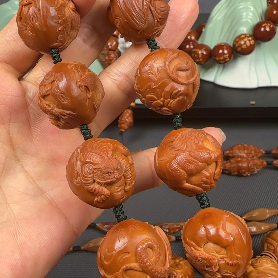 何***然吊坠橄榄核红油核山海经