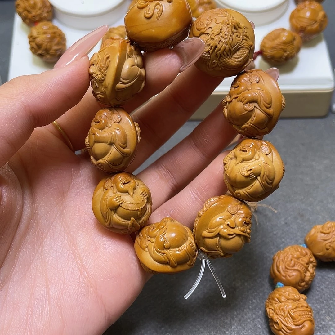 抖***手橄榄核吊坠橄榄核雕