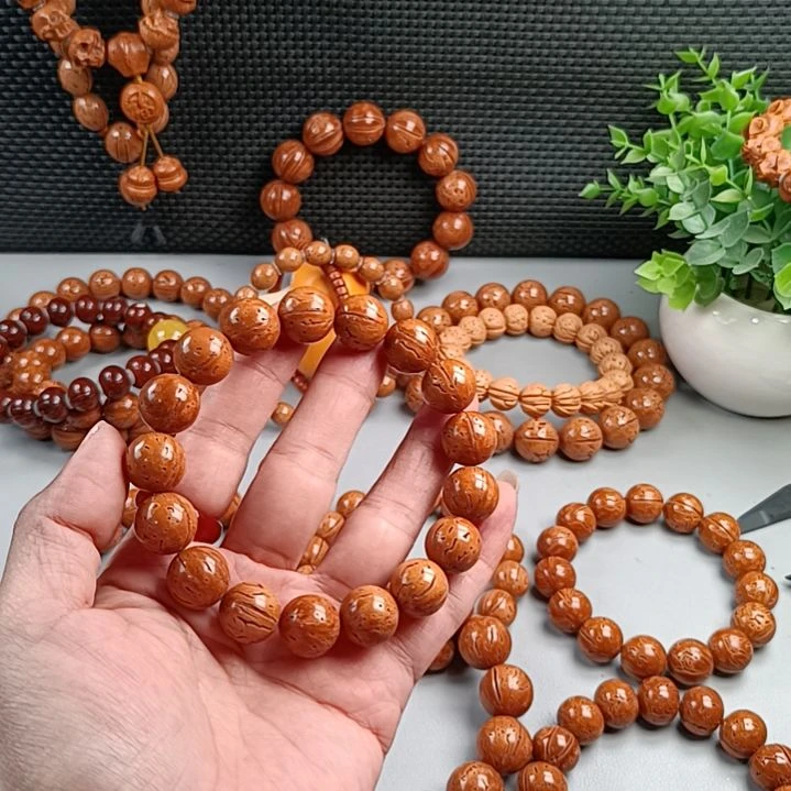 桃核手串铁籽密纹黄皮14