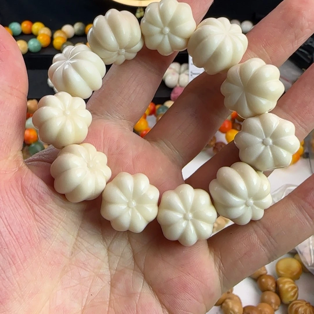 菩提根/象牙果吊坠瑕疵南瓜手串一条