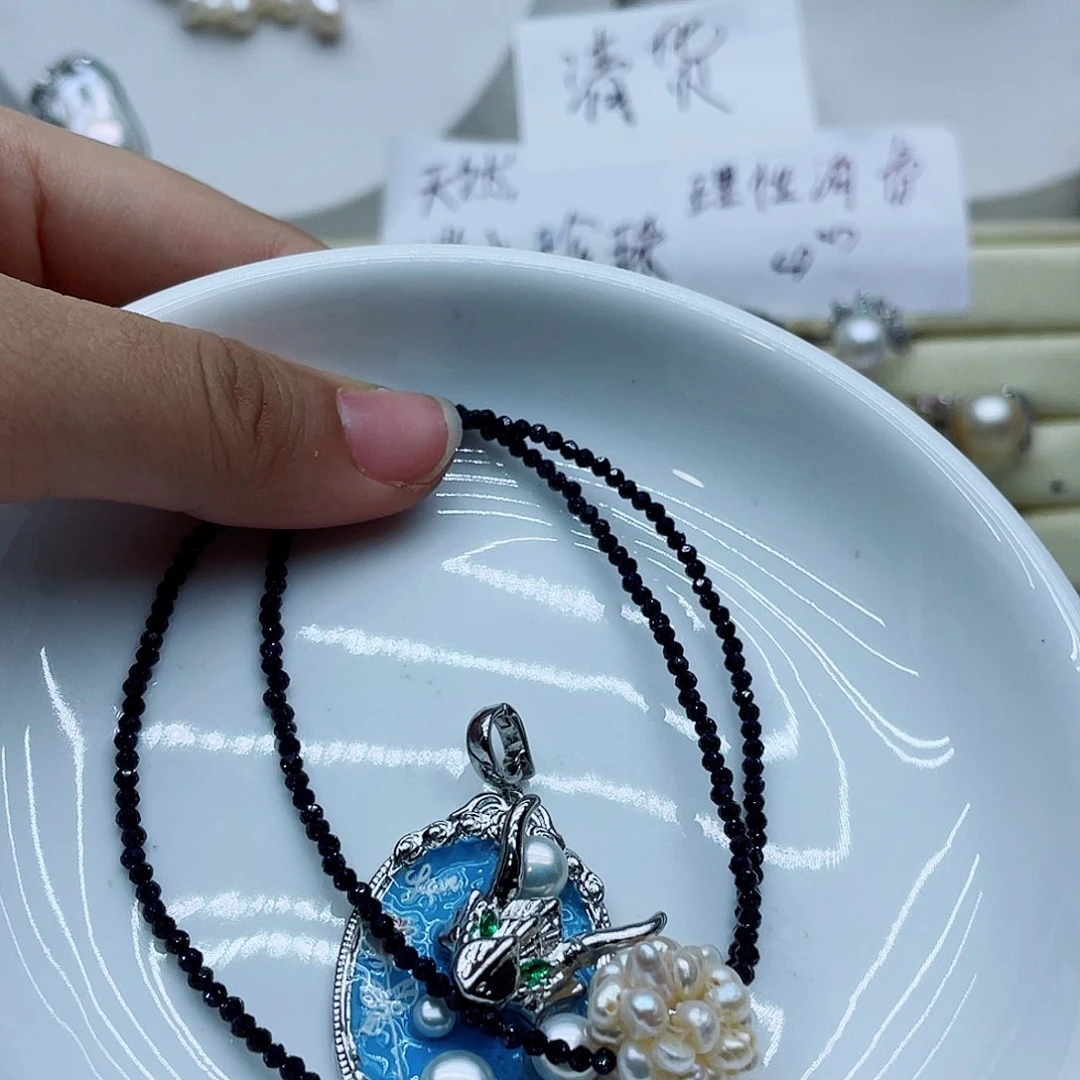 颈饰钛钢淡水珍珠吾*曼