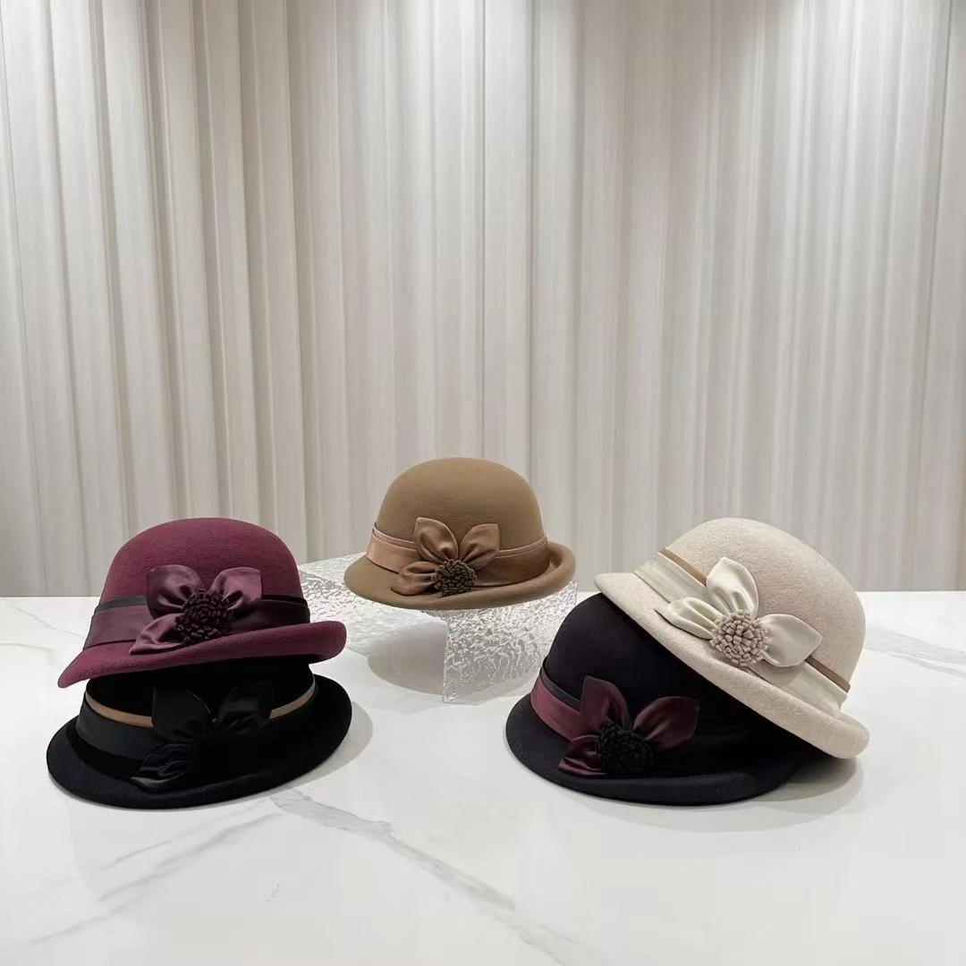 赫本风羊毛呢渔夫帽子女秋冬优雅花朵卷边小礼帽英伦复古百搭盆帽