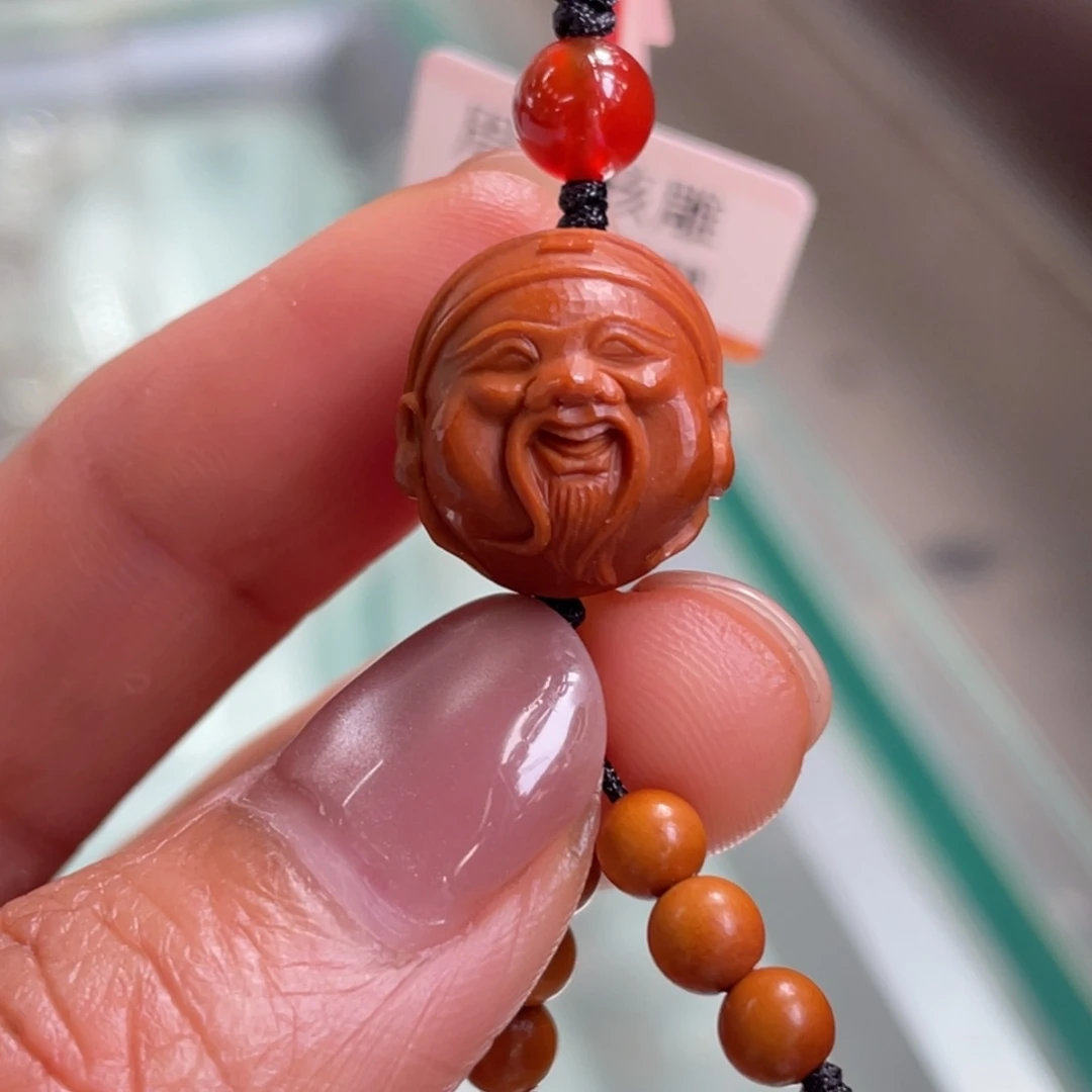 橄榄核吊坠财神头单子