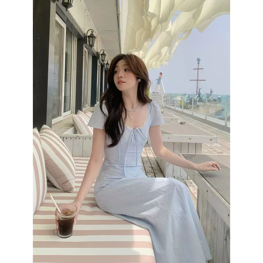 温柔风蕾丝拼接短袖连衣裙女2025夏季新款设计感收腰显瘦A字短裙