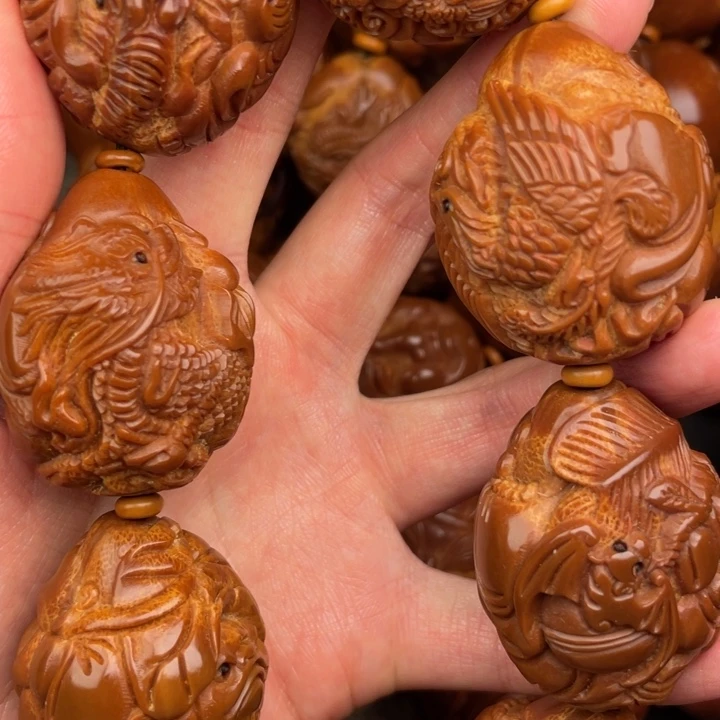 揽***尘吊坠橄榄核橄榄核