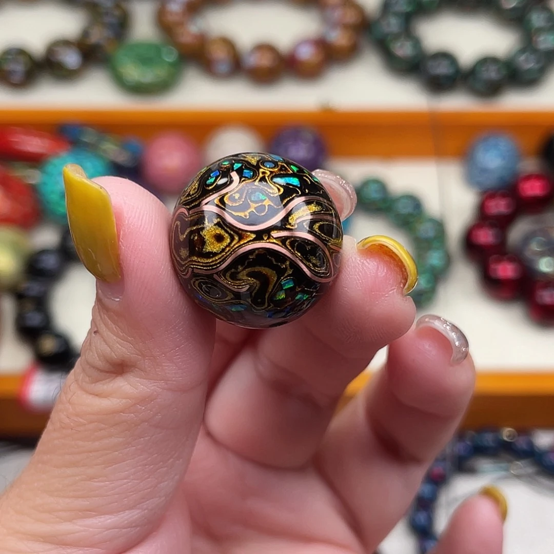 哥****洒2.0黑金掐丝鱼。