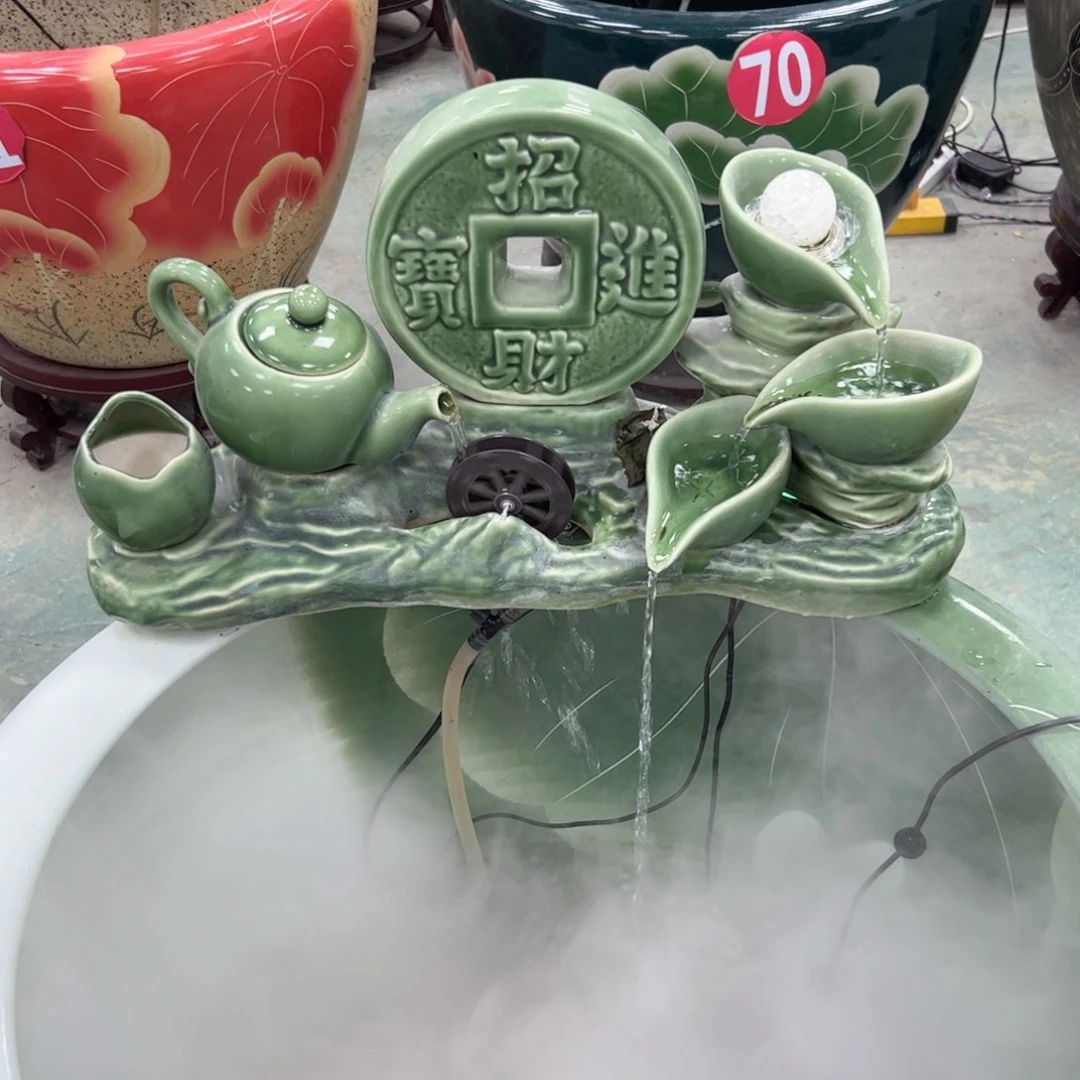 覃***招财茶壶绿色摆件