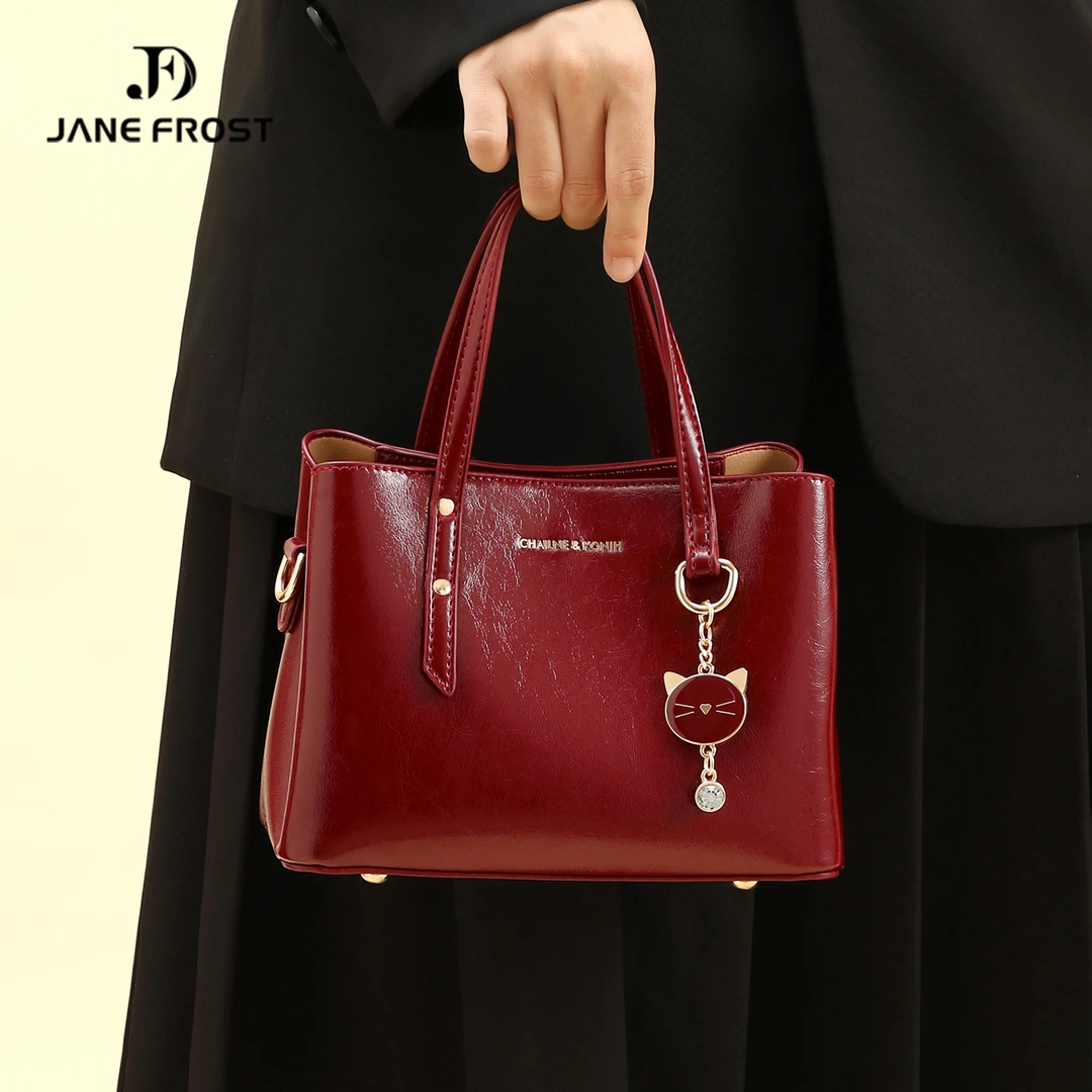 简芙迪红色婚包手提包女2025新款小猫挂件洋气新娘婚包百搭通勤包