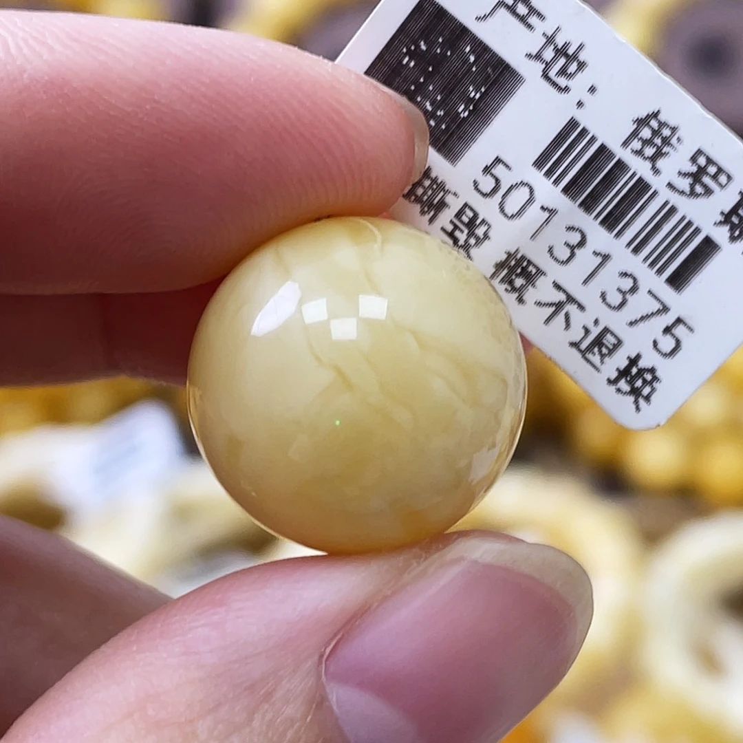 裸石琥珀未镶嵌17mm奶白浓蜡妖花 瑕