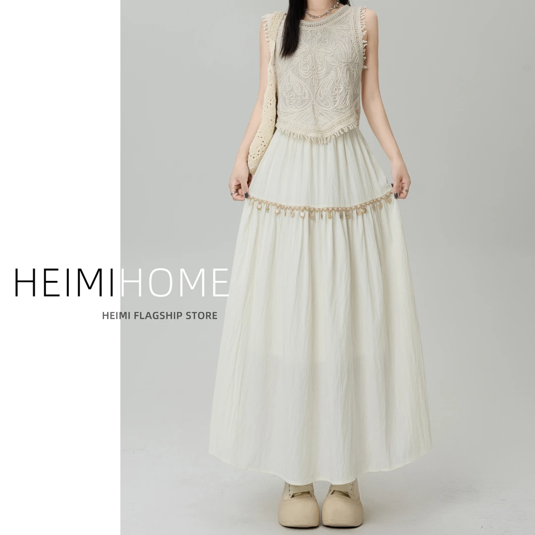 杏色褶皱半身裙女夏薄款松紧高腰贝壳流苏山本裙气质a字大摆伞裙