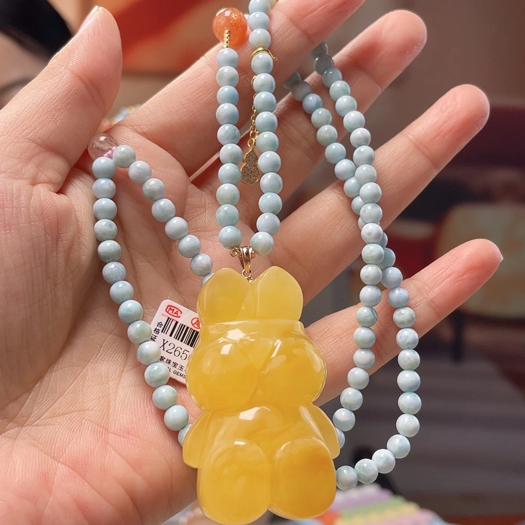 蜜蜡18K金镶嵌裸石蜜蜡吊坠