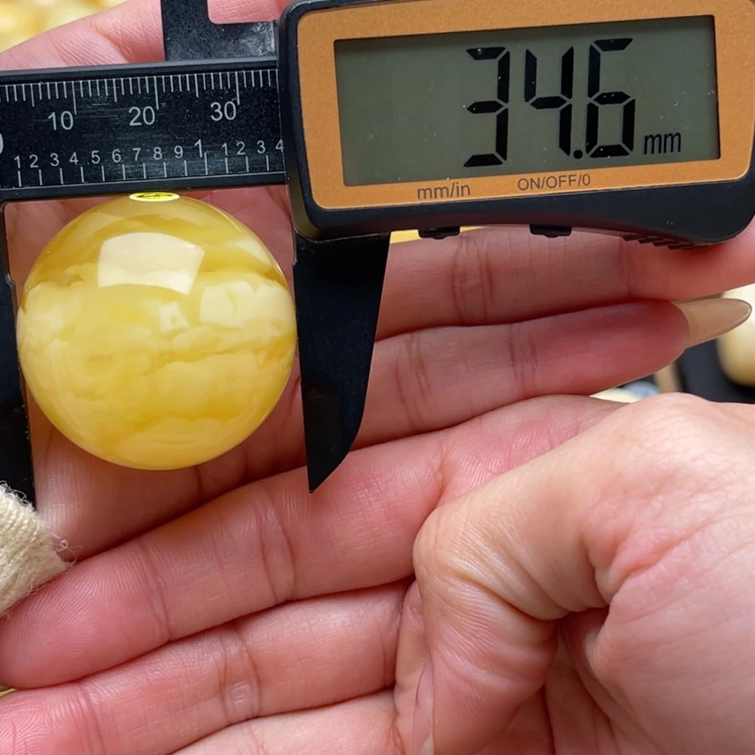 芒***萝琥珀未镶嵌裸石蜜蜡圆珠微瑕笑