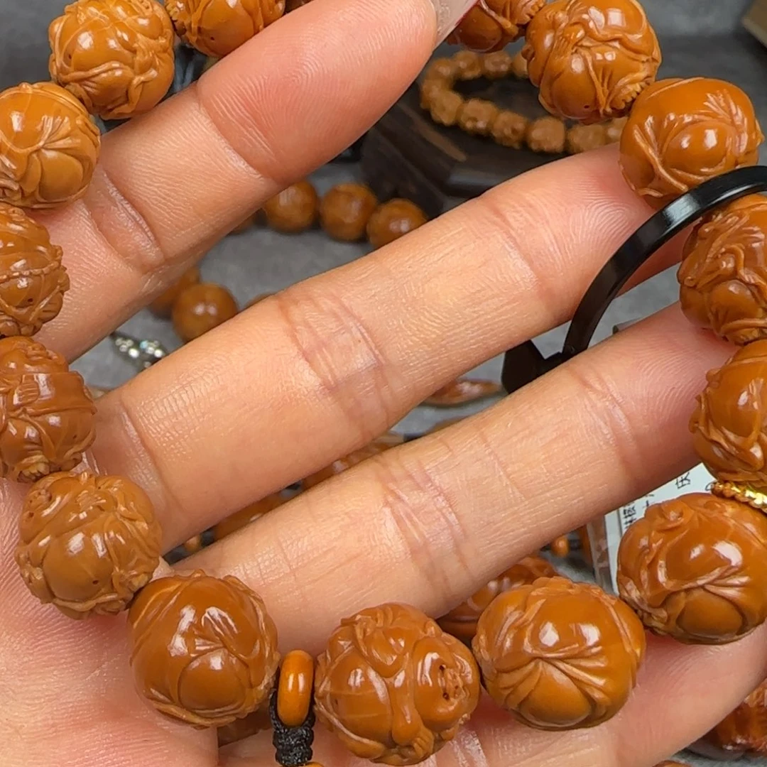 橄榄核吊坠油核18弥勒