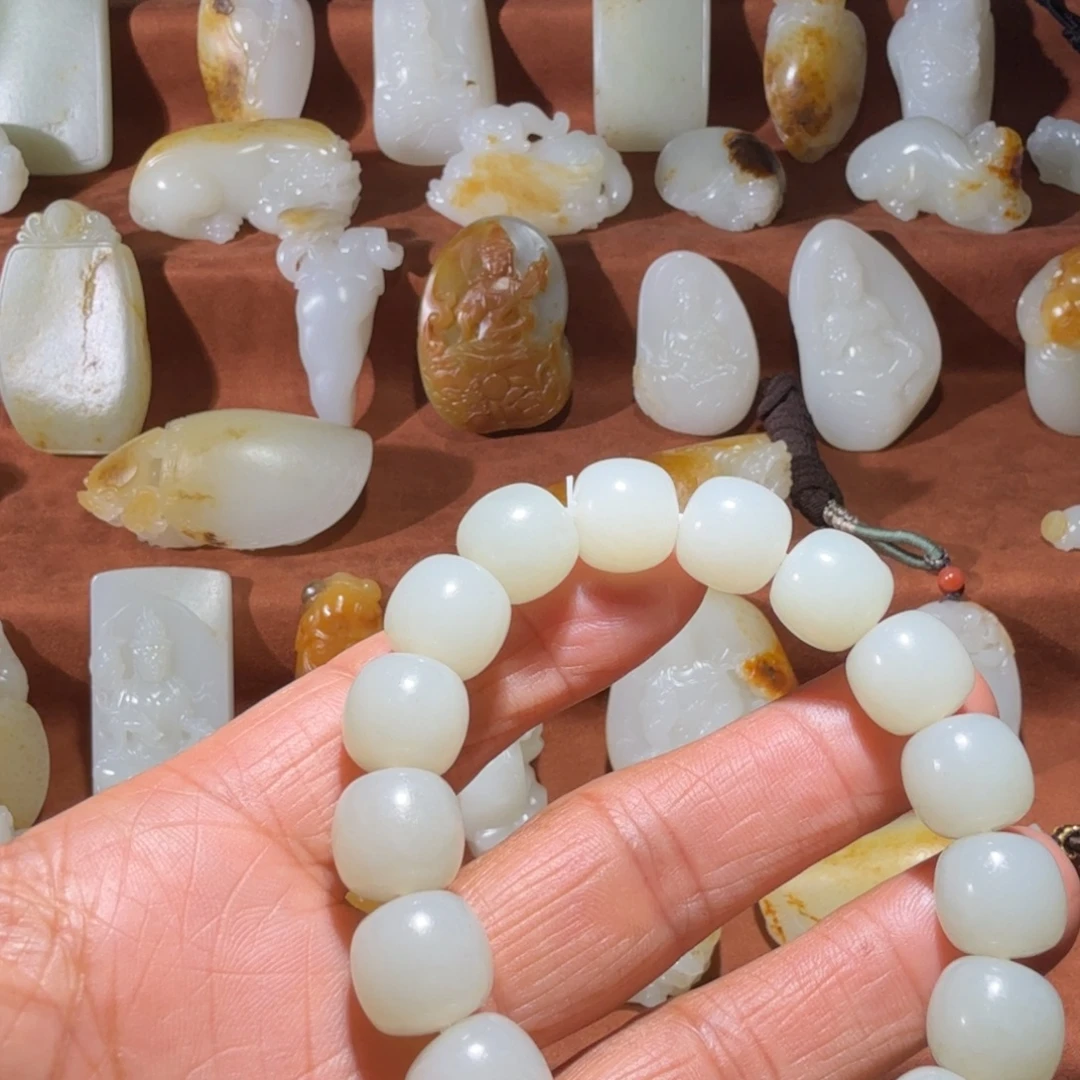 额***拉和田玉未镶嵌手链