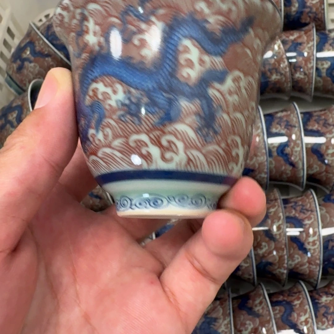 瓷片青釉釉里红海水龙铃铛杯