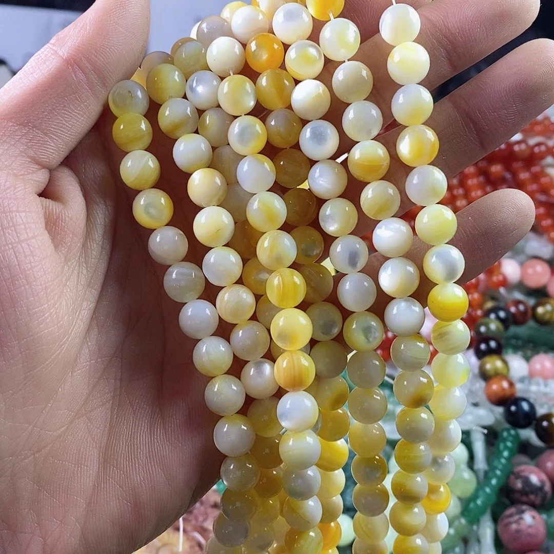 玛瑙/玉髓珠宝半成品合金一条天然8.4mm金蝶贝圆珠深海