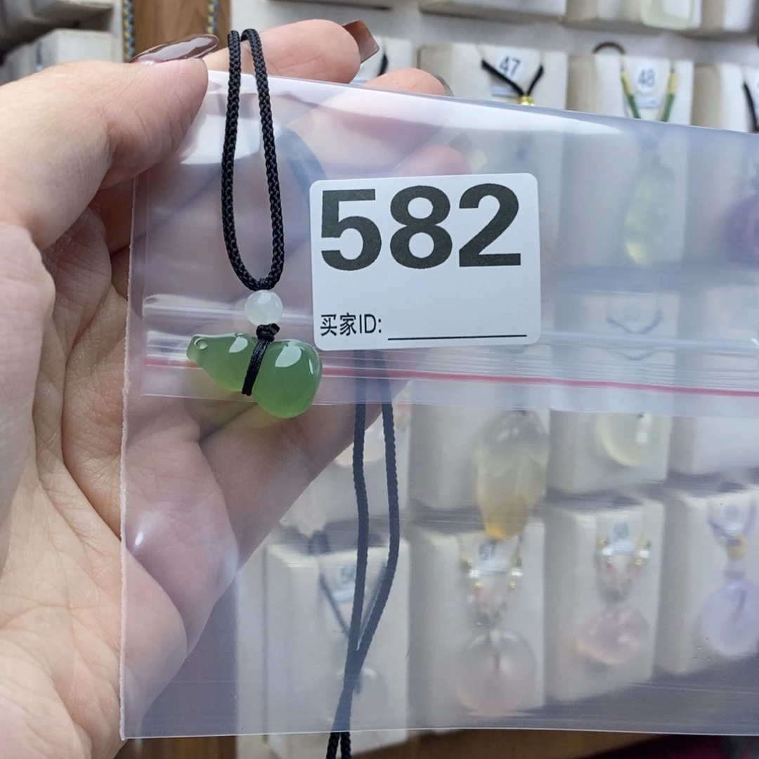 玛瑙/玉髓颈饰合金文**输