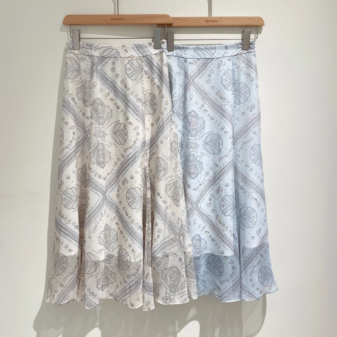 2025飞秒新品《贝壳》夏季百搭气质度假风印花中长款高腰半裙