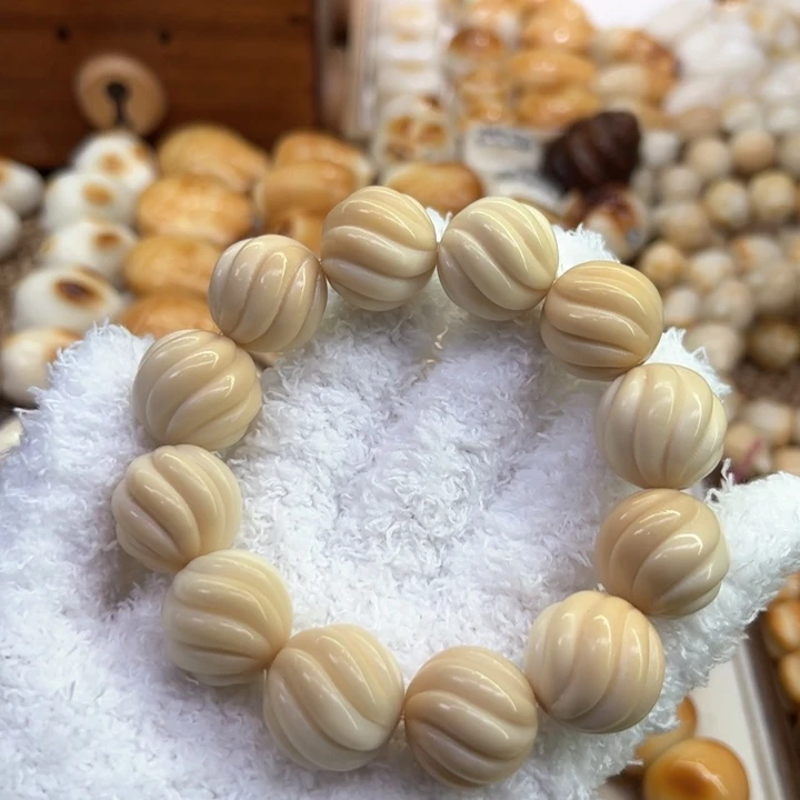 菩提根/象牙果手串3 象牙果原果雕刻溏心扭扭珠微瑕