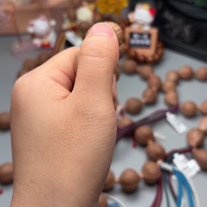 郝***喜橄榄核手串/手链梅林铁核梅林发