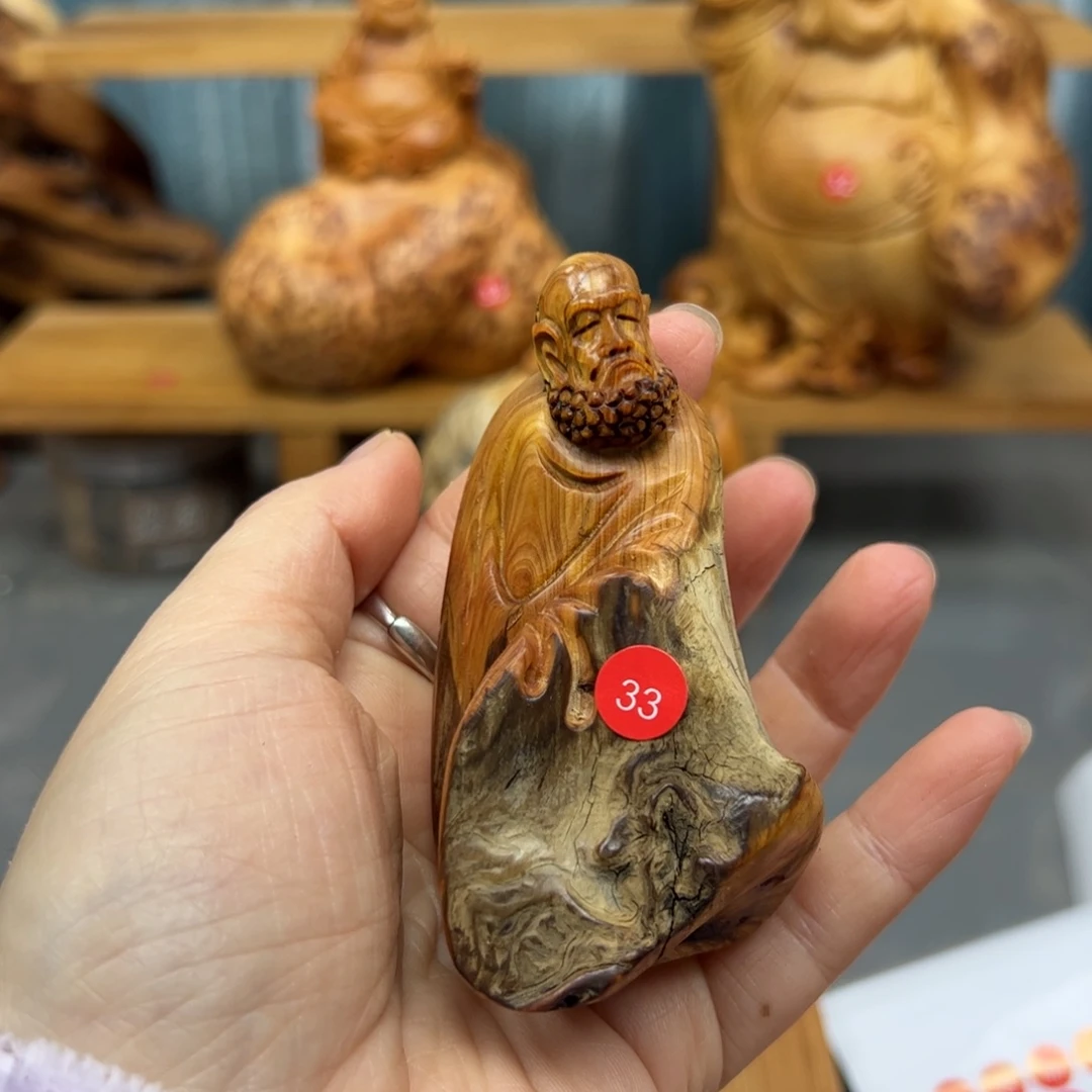 刘***军木崖柏木摆件手把件