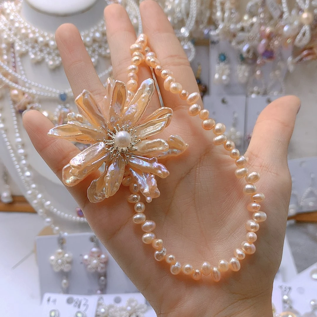 银S925镶嵌耳饰淡水珍珠顾*拉